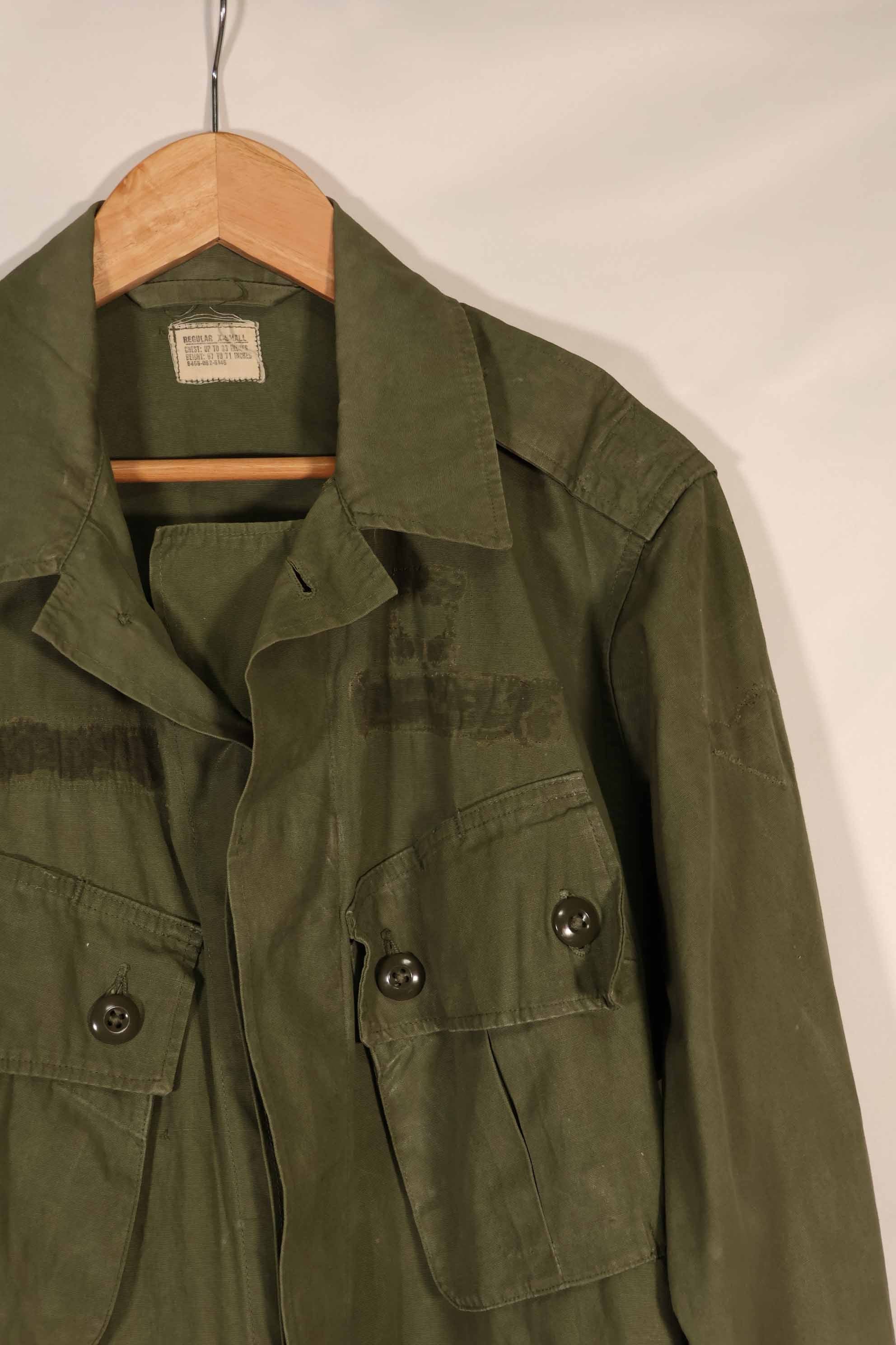 Real 1964 1st Model Jungle Fatigue Jacket, stained, faded, used.