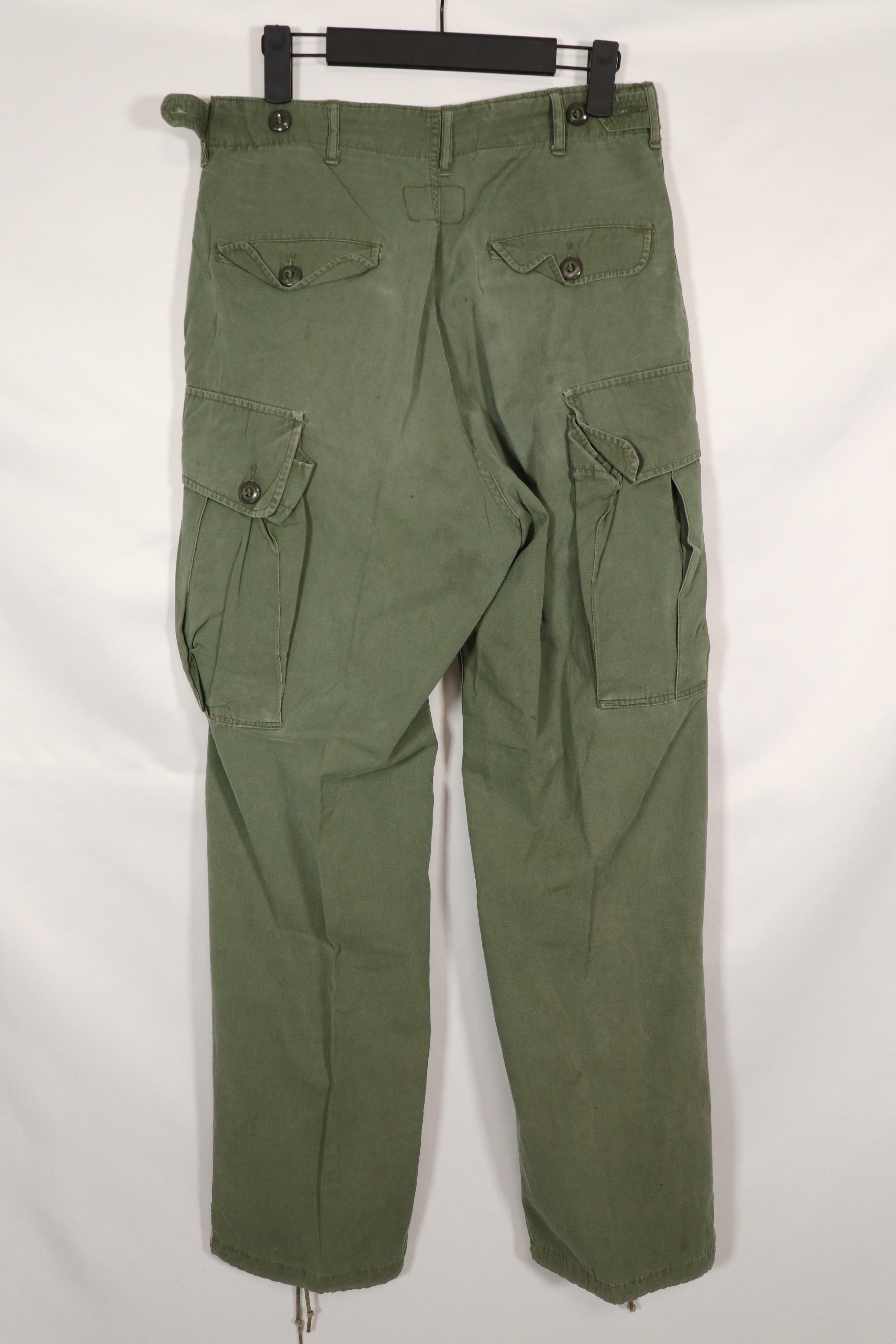 Real 1963 1st Model Jungle Fatigue Pants without leg ties, used.