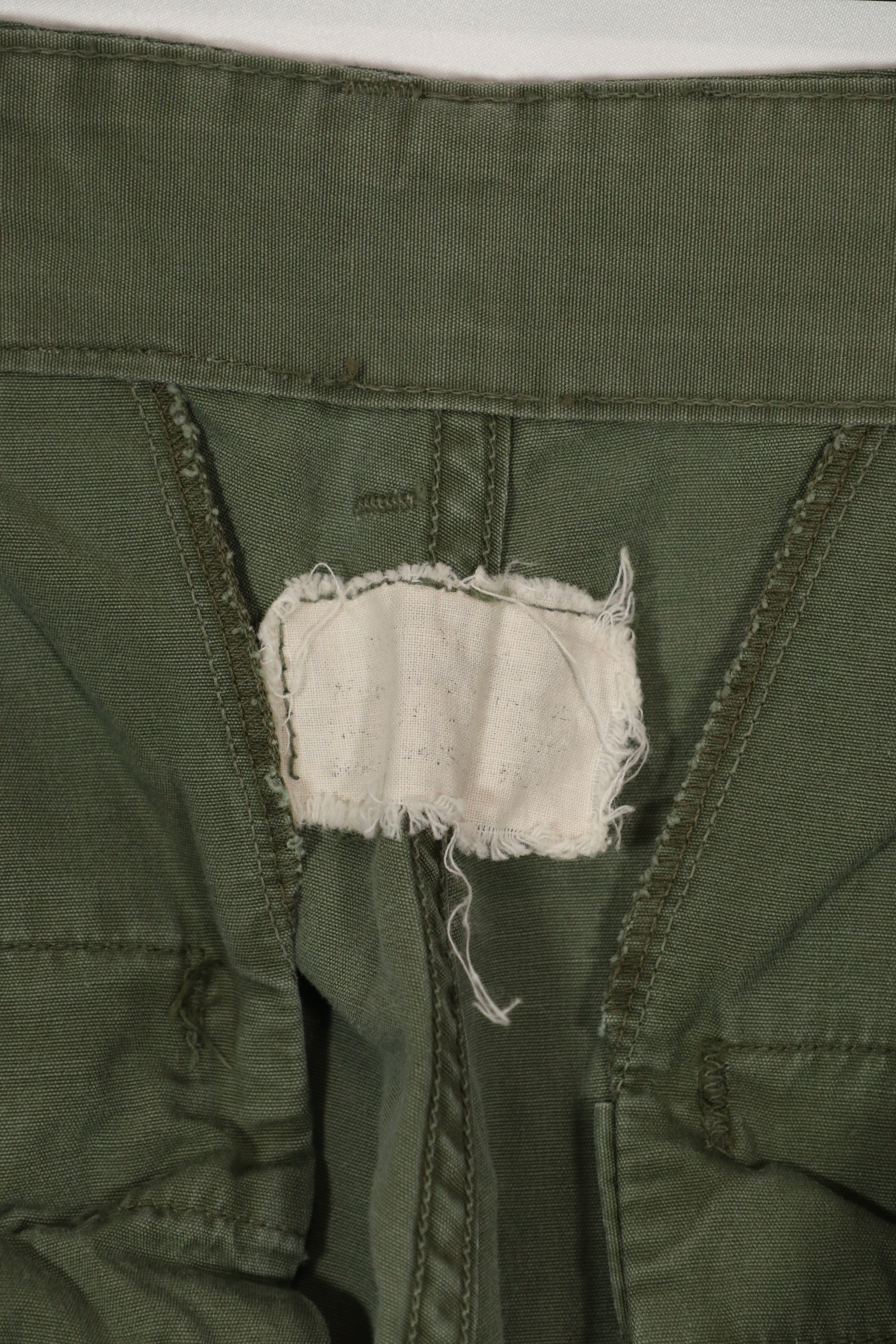 Real 1963 1st Model Jungle Fatigue Pants without leg ties, used.