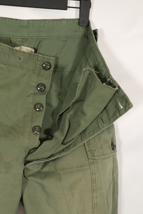 Real 1963 1st Model Jungle Fatigue Pants with leg ties, used.