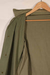 Real 1940s U.S. Marine Corps USMC M41 HBT utility jacket, faded, stained.