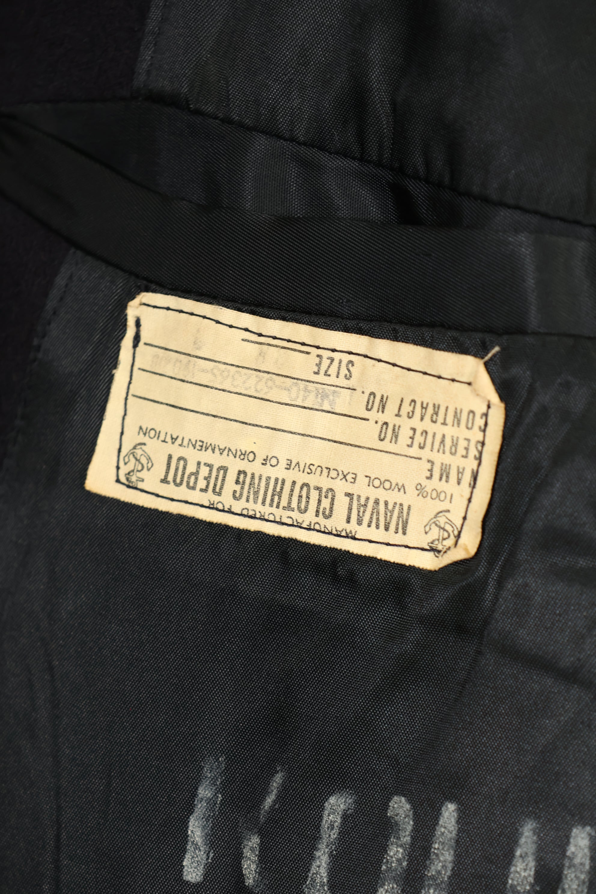 1950's U.S. Navy pea coat, used, slightly worm-eaten.