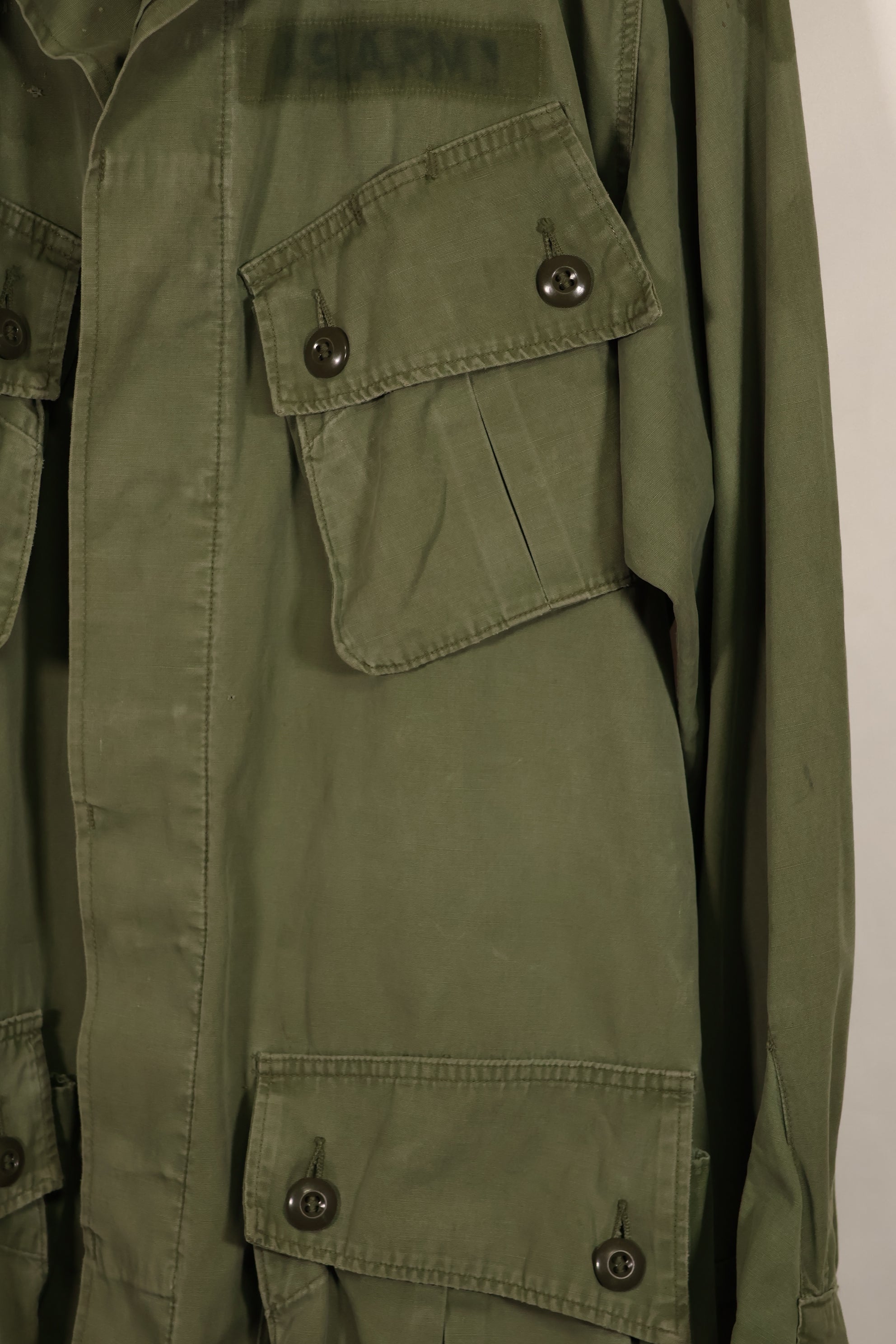 Real 1963-64 1st Model Jungle Fatigue Jacket with patch, used.