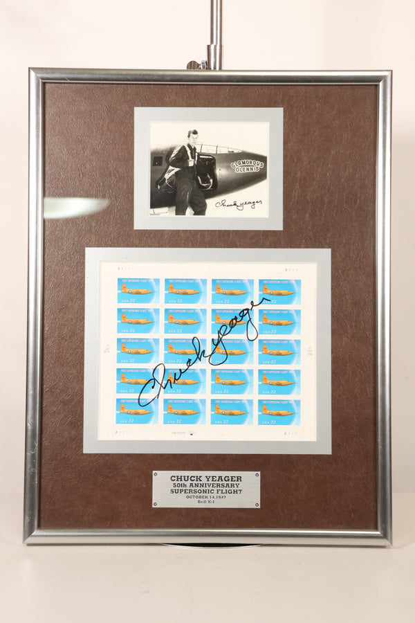Framed photo and stamp autographed by Air Force Brigadier General Chuck Yeager, commemorating the 50th anniversary of breaking the sound barrier.