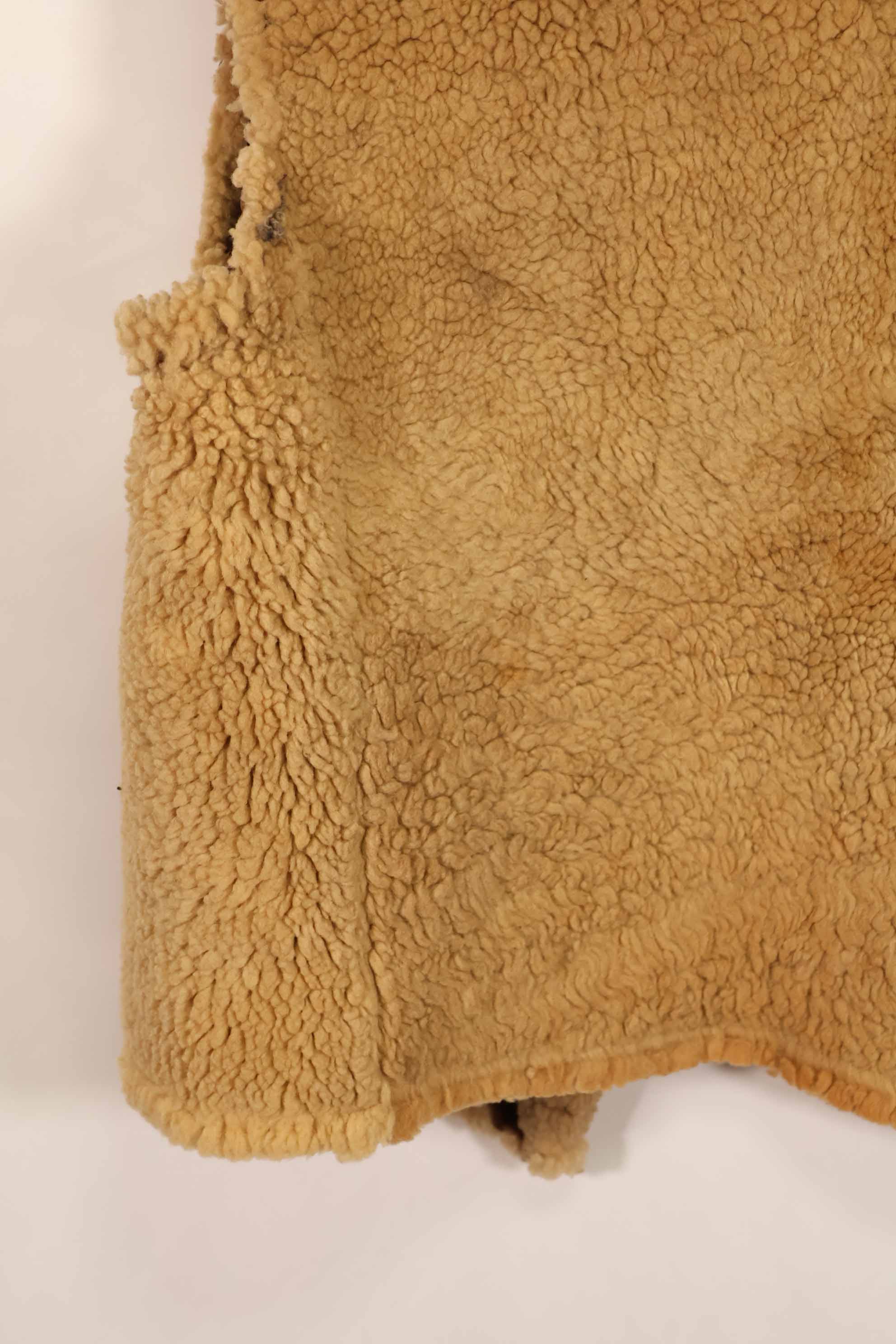 Civilian 1960s-70s sheepskin vest, used, scratches, stains.