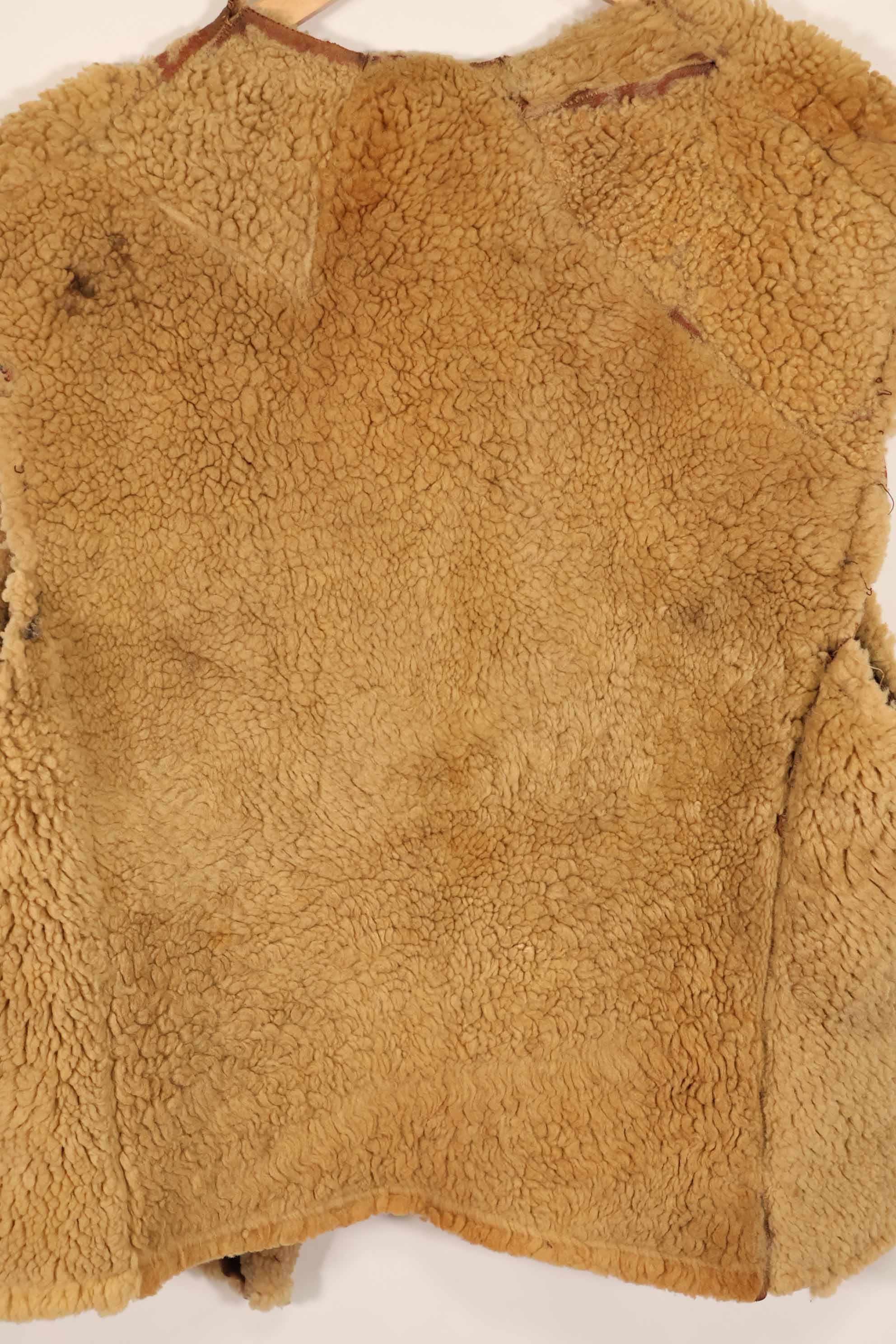 Civilian 1960s-70s sheepskin vest, used, scratches, stains.