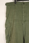 Real 2nd Model Jungle Fatigue Pants with leg ties, large size, stained, used.