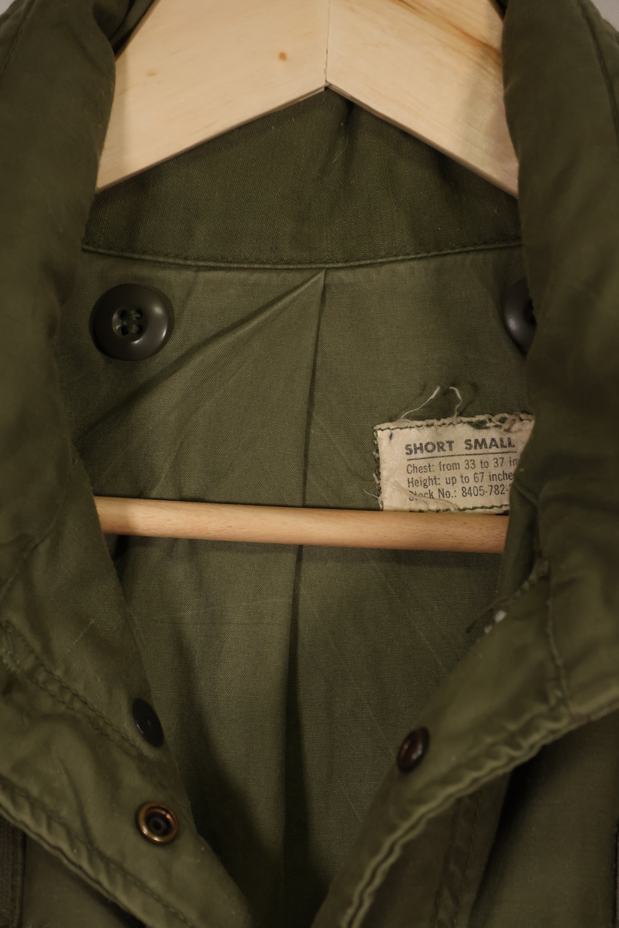 Real owned by former SF member, first model M65 field jacket, estimated 1965-1966, used.