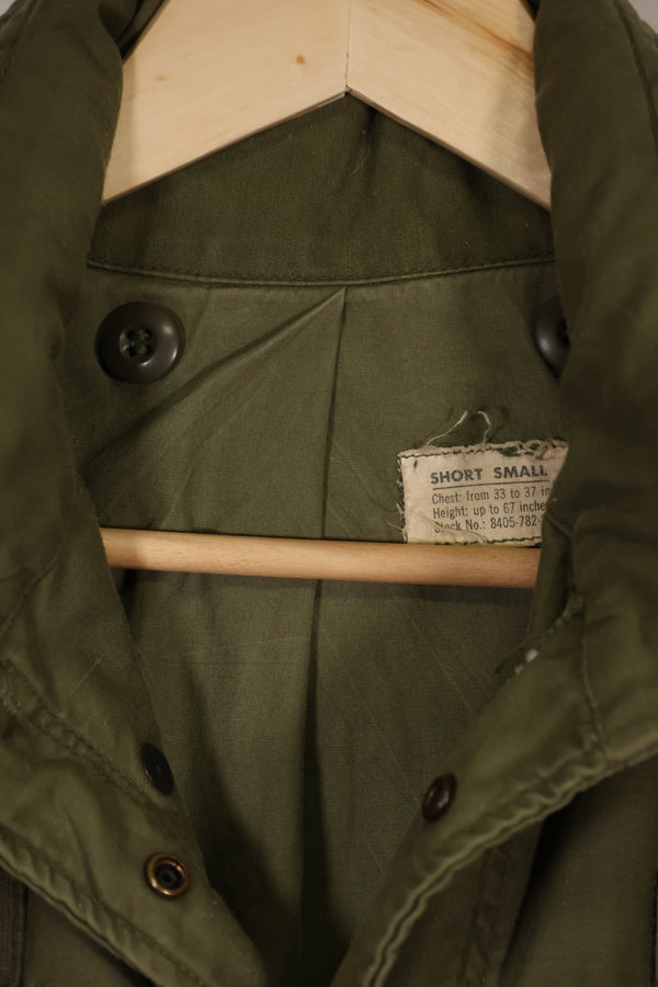 Real owned by former SF member, first model M65 field jacket, estimated 1965-1966, used.