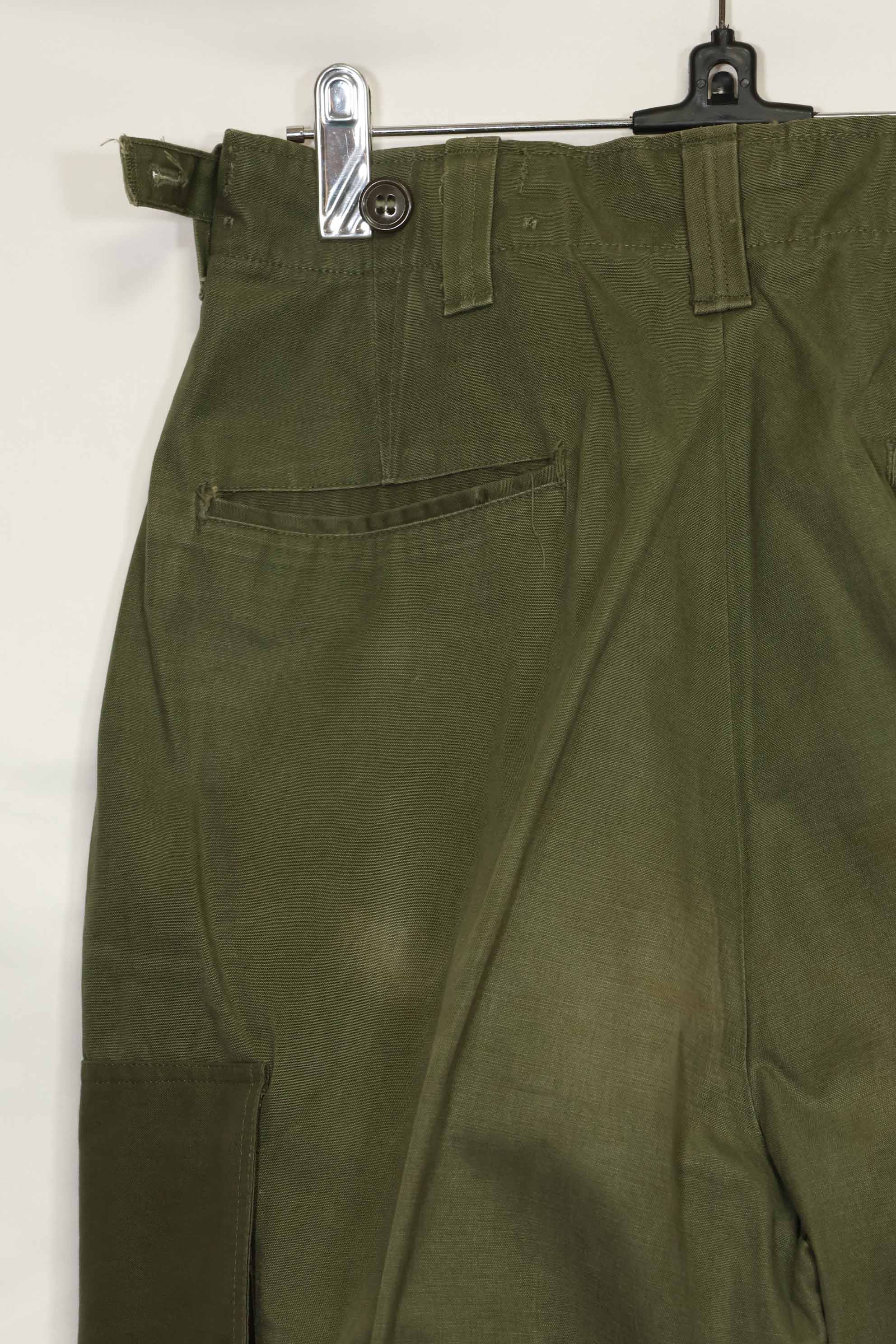 1940s-50s US Army M45 cotton field pants with modified cargo pockets, airborne use, used, B