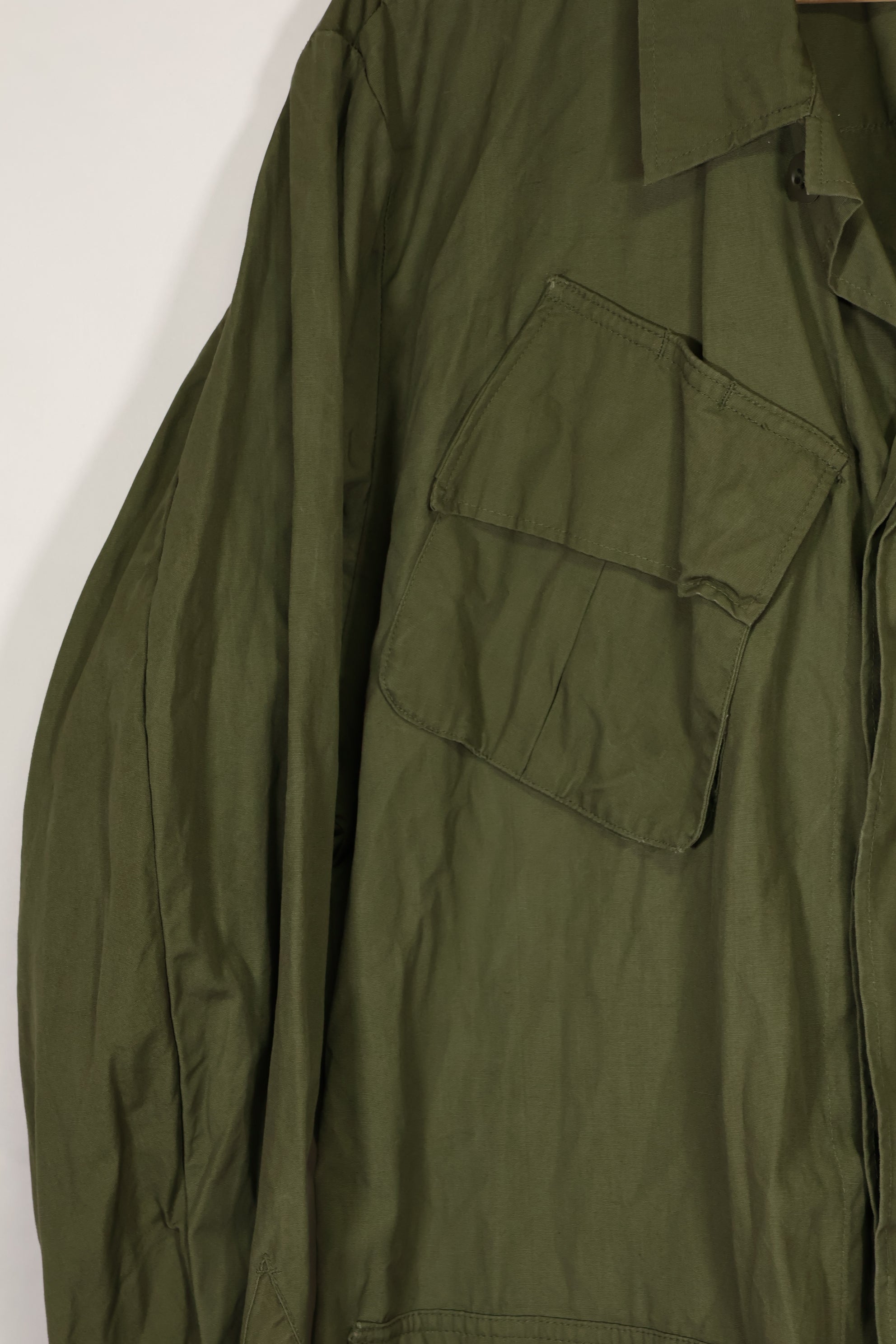 Real 1966-1967 3rd Model Jungle Fatigue Jacket L-R with damage.