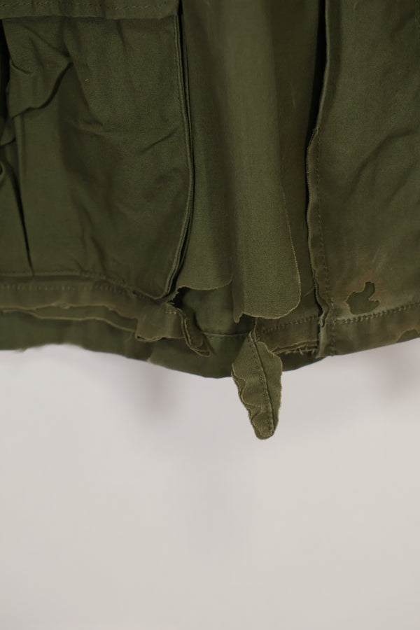 Real 1966-1967 3rd Model Jungle Fatigue Jacket L-R with damage.