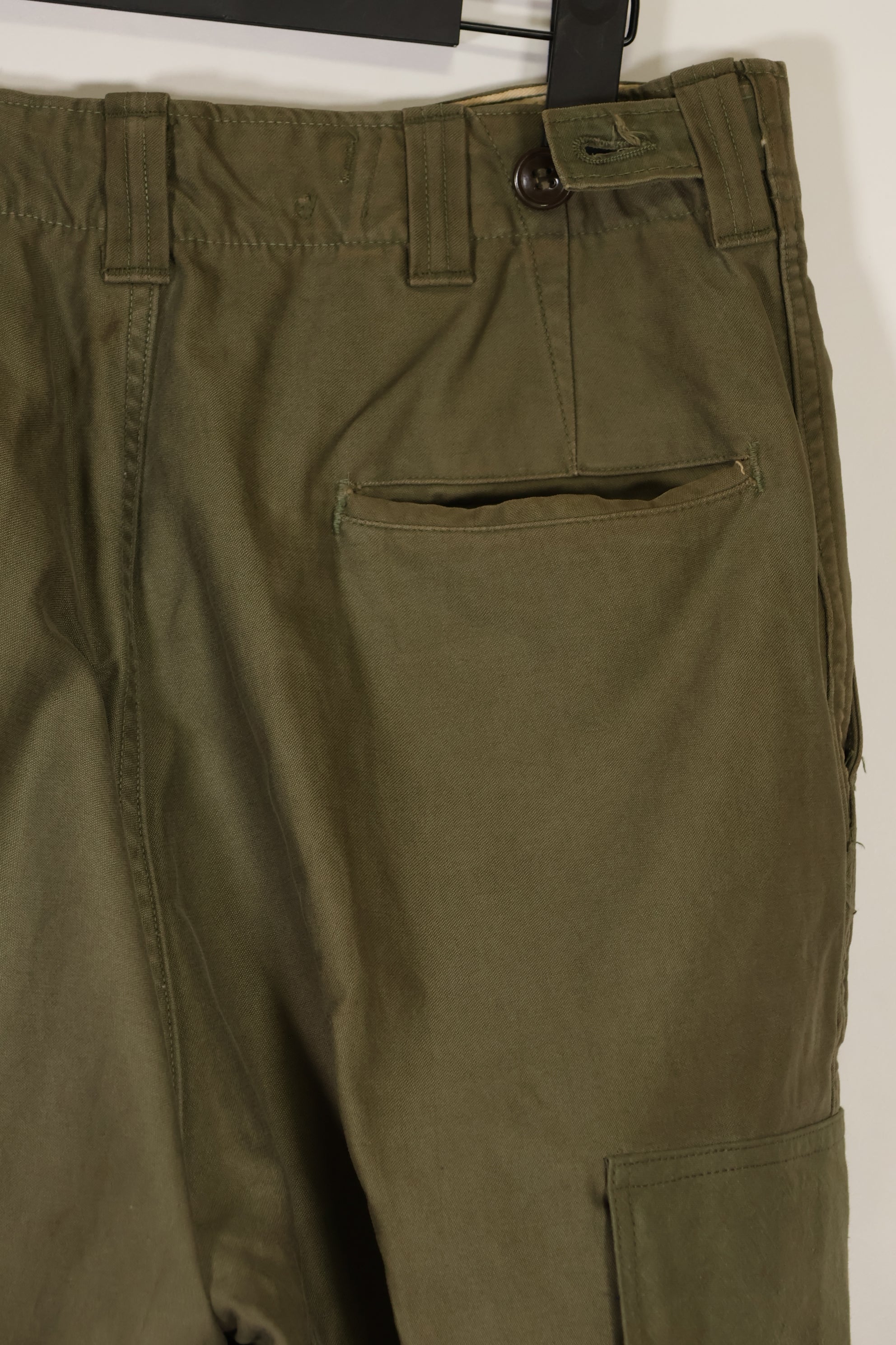 Real U.S. Army M45 pants with additional pocket modification, used.