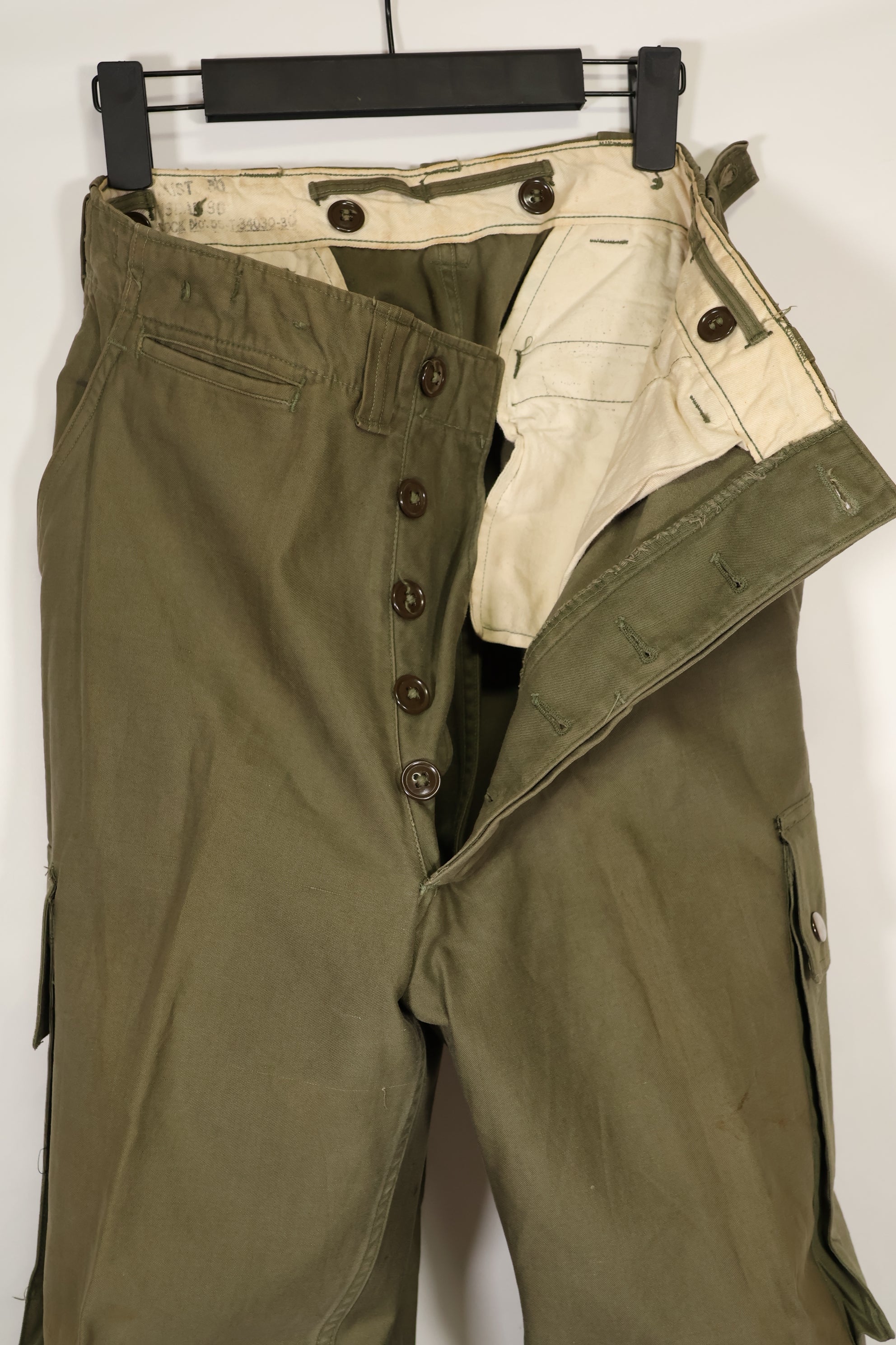 Real U.S. Army M45 pants with additional pocket modification, used.