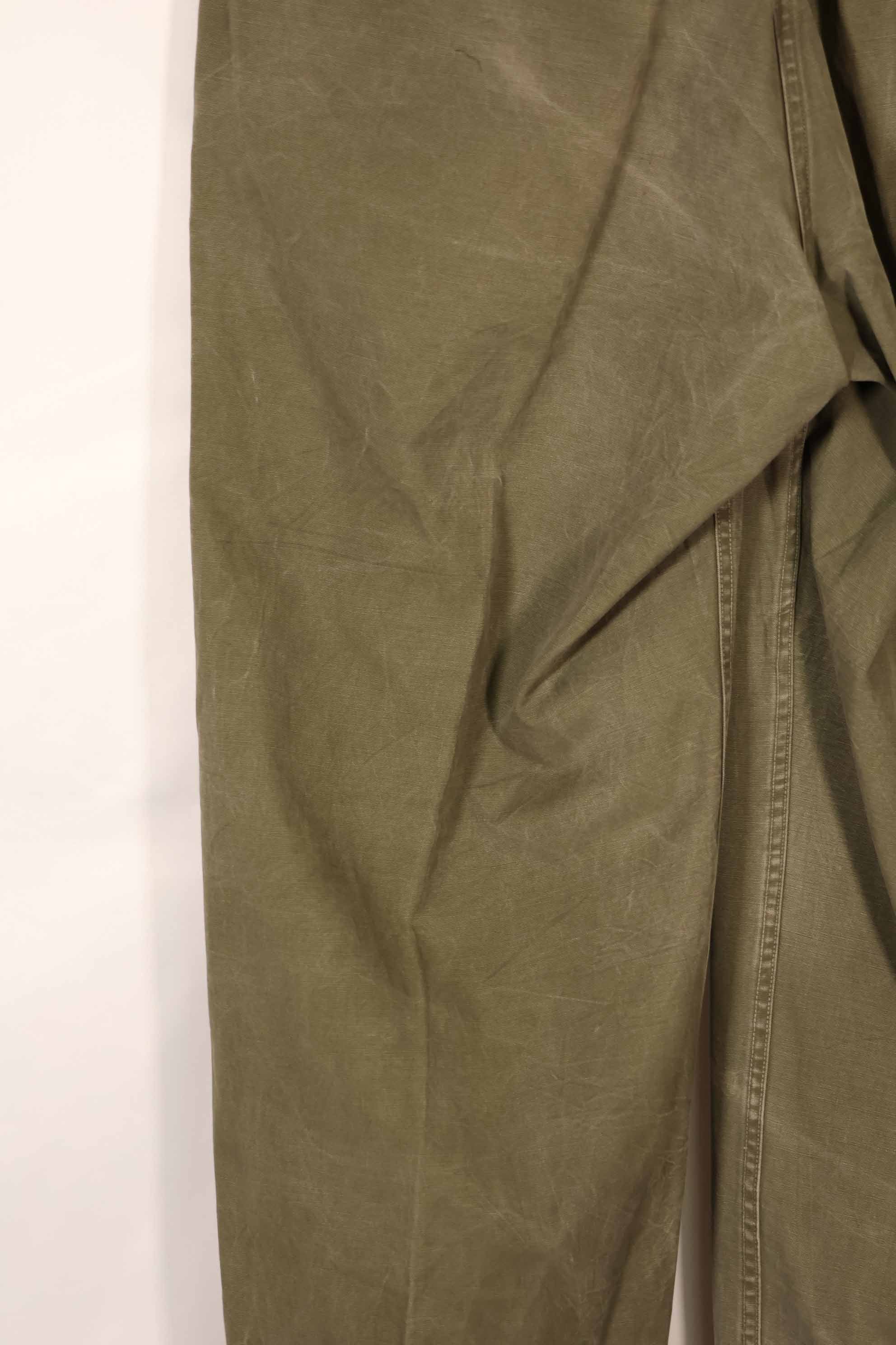 Real late 1940s - early 1950s M45 OD cotton field pants, used, strong signs of use.