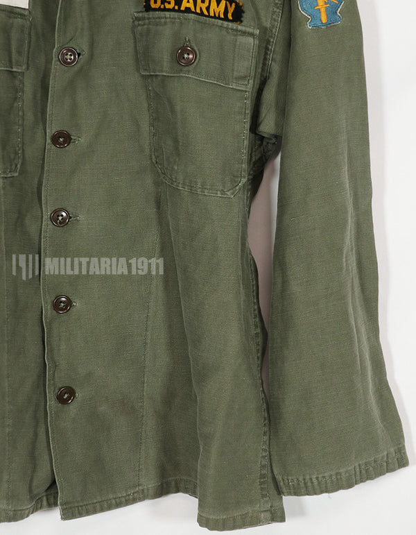 Real early OG-107 utility shirt with special forces patch, faded, used.