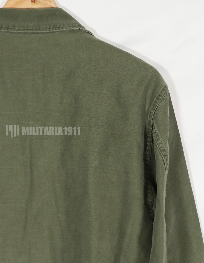 Real early OG-107 utility shirt with special forces patch, faded, used.