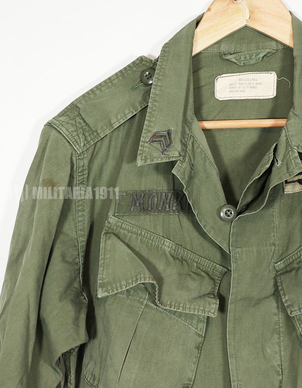 Real 2nd Model Jungle Fatigue Jacket, used, with patches and rank insignia.