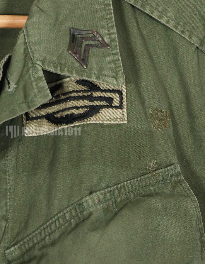 Real 2nd Model Jungle Fatigue Jacket, used, with patches and rank insignia.