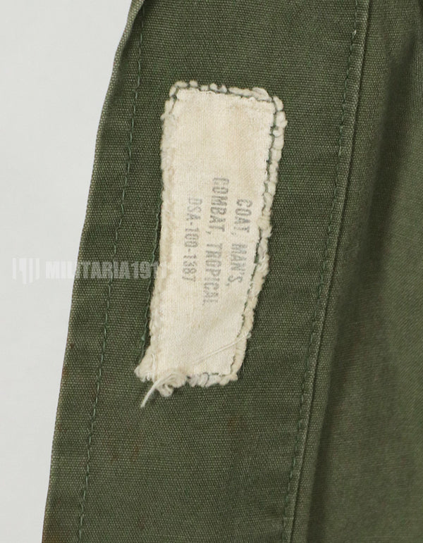 Real 2nd Model Jungle Fatigue Jacket, used, with patches and rank insignia.