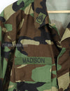 Real U.S. Army Woodland Camouflage Jacket, 2000, with patches.