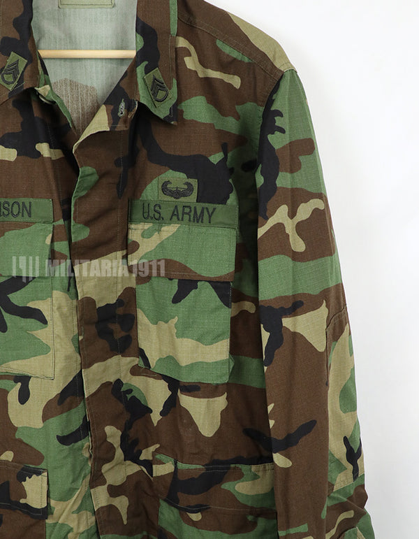 Real U.S. Army Woodland Camouflage Jacket, 2000, with patches.