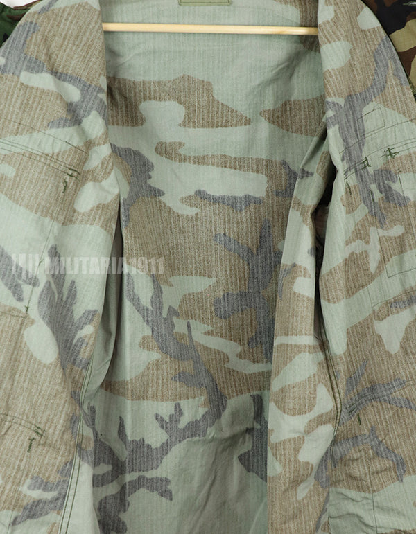 Real U.S. Army Woodland Camouflage Jacket, 2000, with patches.