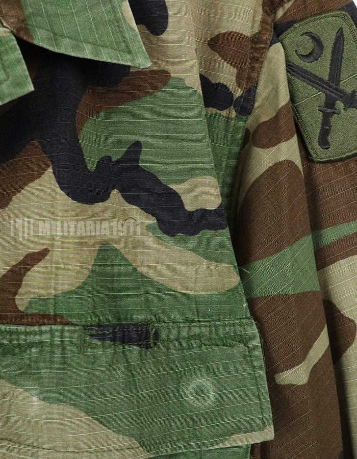 Real U.S. Army Woodland Camouflage Jacket, 2007, with patches.