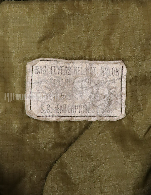 Original U.S. military release, 80's, helmet bag, poor condition, stained, age tag unreadable.