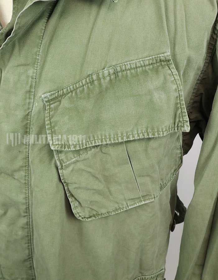 Real 2nd model jungle fatigues jacket, worn, scratched, faded.