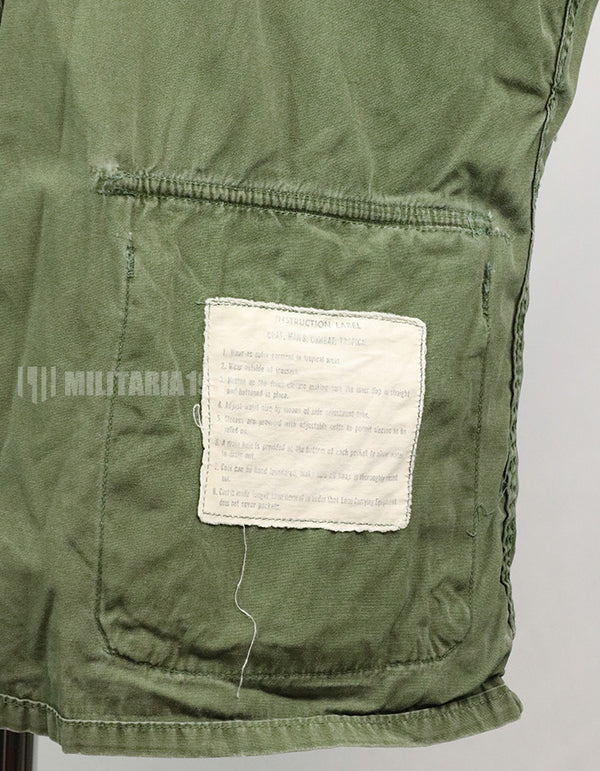 Real 2nd model jungle fatigues jacket, worn, scratched, faded.